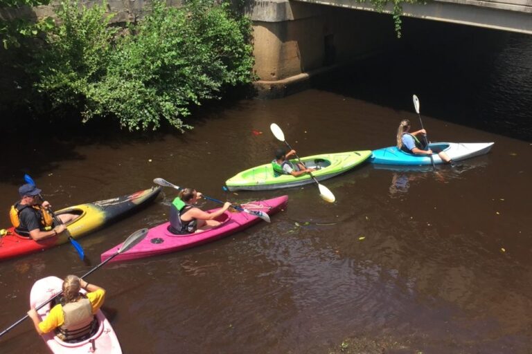 Kayaking-under-the-bridge-on-Washington-St-at-low-tide-1000x667